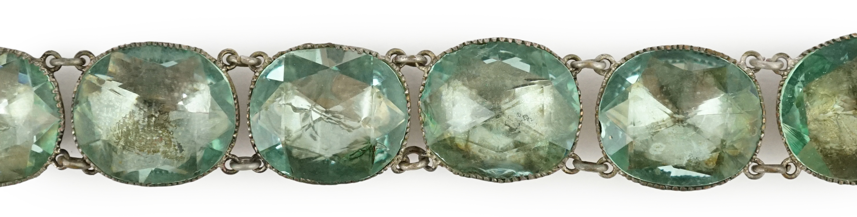 A rare 18th century 'Queen Anne' silvered metal and foil backed aquamarine paste necklace